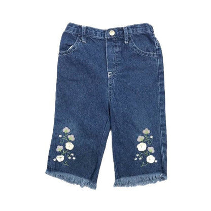 Zilas džinsu bikses ar puķītēm